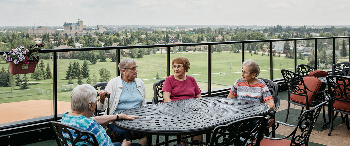esidents enjoying outdoor patio